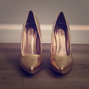 Gold high heels